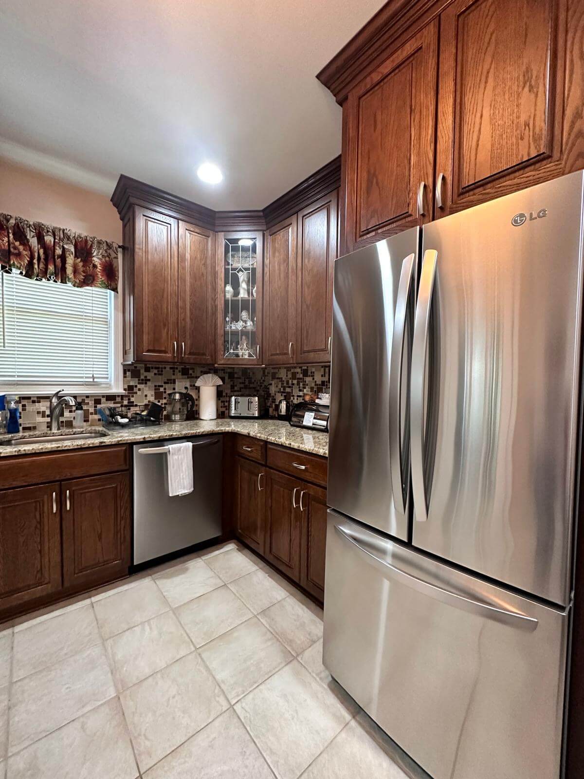 Oak cabinets & stainless steel · degreased